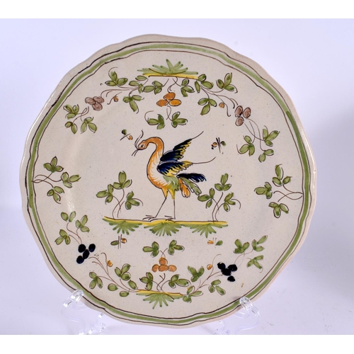 73 - A PAIR OF FRENCH FAIENCE TIN GLAZED POTTERY PLATES. 21 cm diameter.