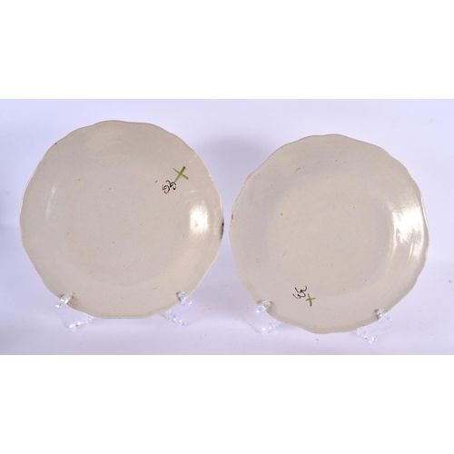 73 - A PAIR OF FRENCH FAIENCE TIN GLAZED POTTERY PLATES. 21 cm diameter.