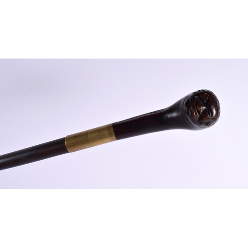 739 - AN UNUSUAL 19TH CENTURY TRIBAL DOUBLED HEADED WALKING CANE or possibly earlier and Continental. 90 c... 