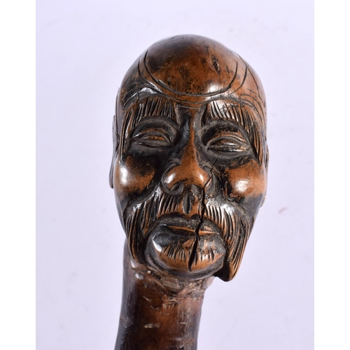 740 - AN UNUSUAL 19TH CENTURY CHINESE CARVED ROOTWOOD WALKING CANE Qing. 85 cm long.