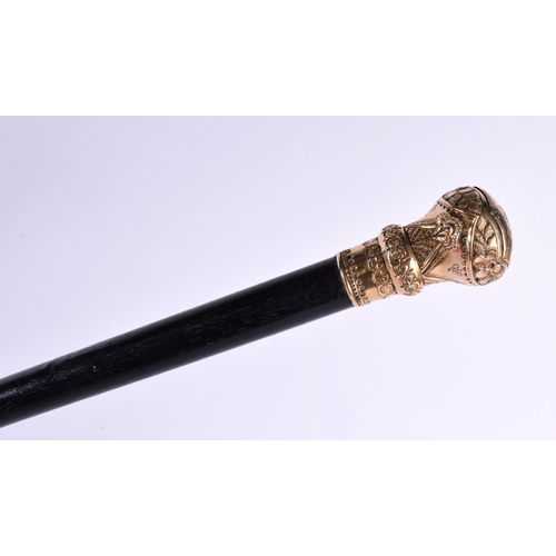 741 - AN EARLY VICTORIAN YELLOW METAL MOUNTED WALKING CANE possibly high carat gold. 90 cm long.