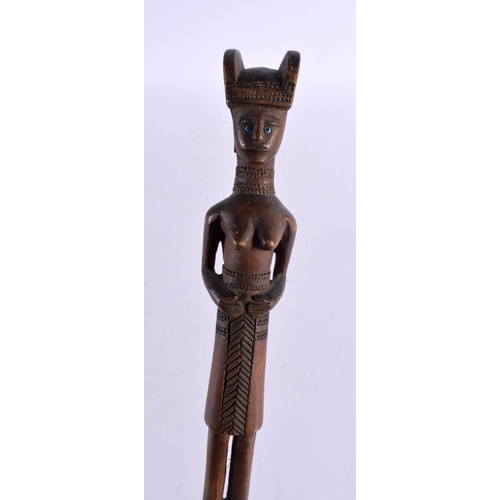 742 - AN EARLY 20TH CENTURY AFRICAN TRIBAL CARVED WOOD FERTILITY STAFF with bead work eyes. 95 cm long.