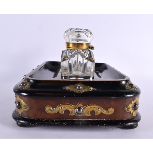 752 - A VICTORIAN EBONISED WALNUT INKSTAND with brass fittings, glass inkwell and drawer below. 24 cm x 16... 