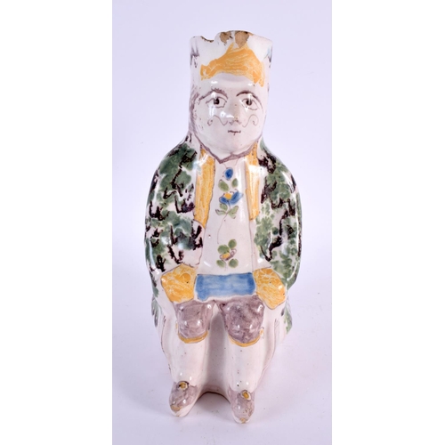 76 - AN 18TH/19TH CENTURY FRENCH FAIENCE TIN GLAZED TOBY JUG painted with flowers. 25 cm high.