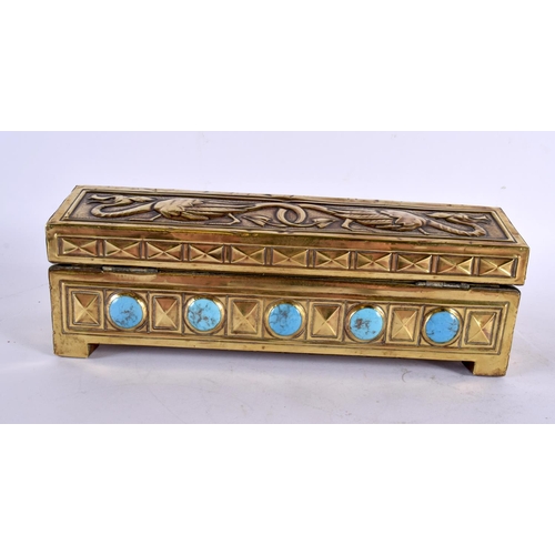 761 - AN UNUSUAL ARTS AND CRAFTS REPOUSSE BRASS TURQUOISE PORCELAIN INSET CASKET together with a similar b... 