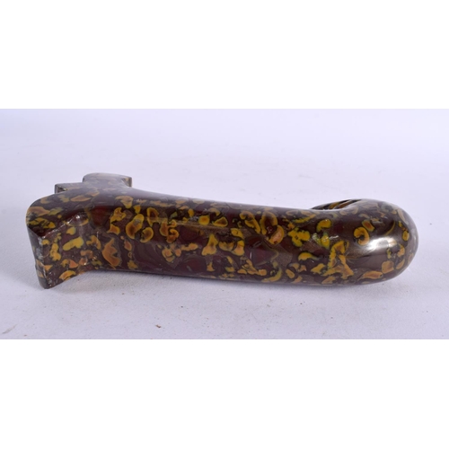 767 - A MIDDLE EASTERN MUGHAL TYPE CARVED PUDDINGSTONE AGATE DAGGER HANDLE with bird head terminal. 14 cm ... 