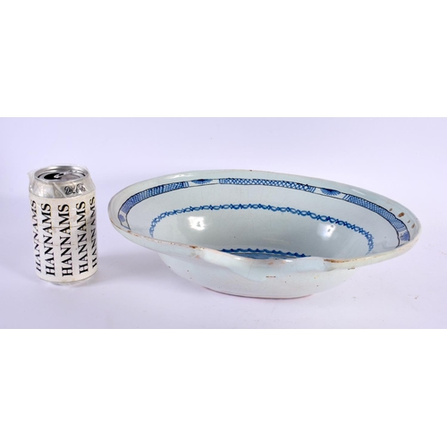 77 - A LARGE 18TH/19TH CENTURY DELFT TIN GLAZED BARBERS BOWL painted with insects. 30 cm x 24 cm.