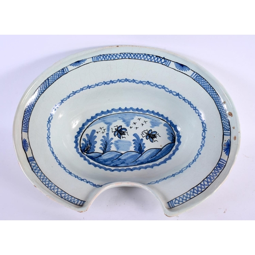 77 - A LARGE 18TH/19TH CENTURY DELFT TIN GLAZED BARBERS BOWL painted with insects. 30 cm x 24 cm.