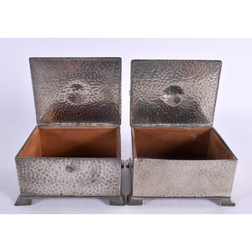 771 - A PAIR OF ART DECO CIVIC PEWTER GOLFING CIGARETTE BOXES AND COVERS formed with clubs and balls. 11.5... 