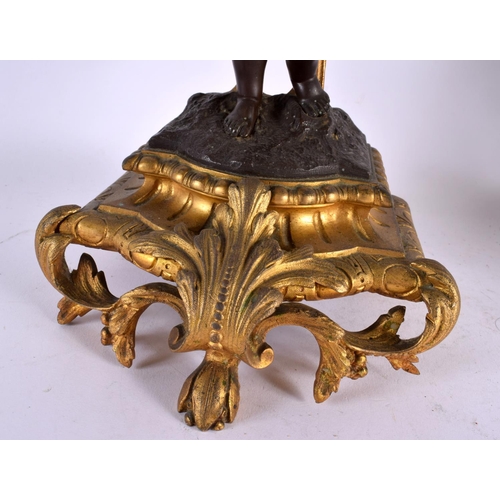 774 - A LARGE PAIR OF 19TH CENTURY FRENCH BRONZE CANDLEABRA formed as putti. 56 cm x 22 cm.