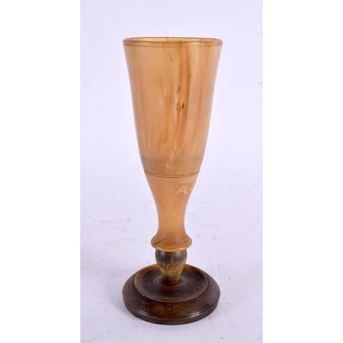 782 - A 19TH CENTURY CONTINENTAL CARVED RHINOCEROS HORN GOBLET. 57 grams. 12 cm high.