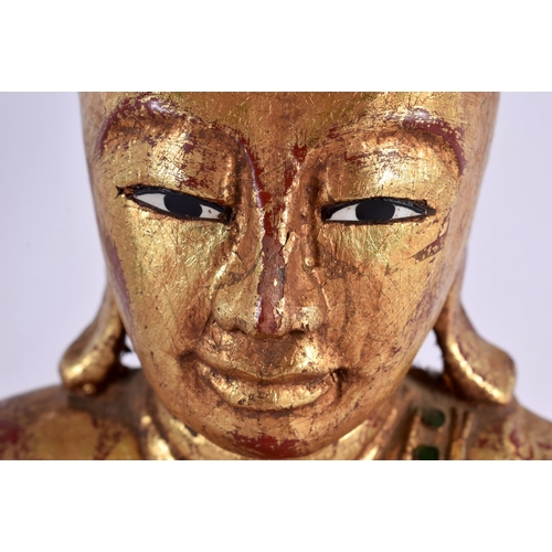 786 - AN INDIAN ASIAN CARVED POLYCHROMED WOOD FIGURE OF A BUDDHA. 32 cm x 18 cm.