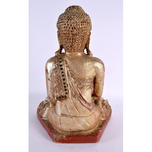 786 - AN INDIAN ASIAN CARVED POLYCHROMED WOOD FIGURE OF A BUDDHA. 32 cm x 18 cm.