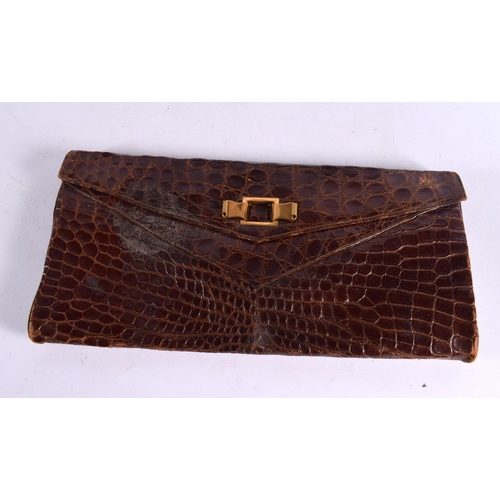 793 - THREE VINTAGE CROCODILE SKIN BAGS. Largest 32 cm x 22 cm. (3)