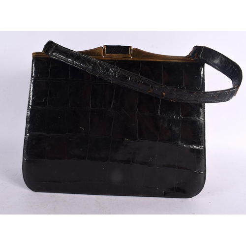 793 - THREE VINTAGE CROCODILE SKIN BAGS. Largest 32 cm x 22 cm. (3)