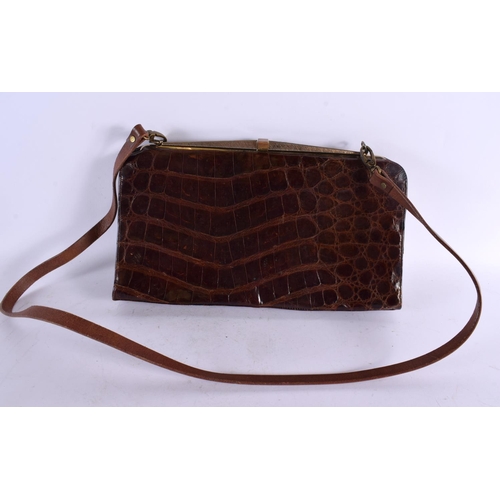 793 - THREE VINTAGE CROCODILE SKIN BAGS. Largest 32 cm x 22 cm. (3)