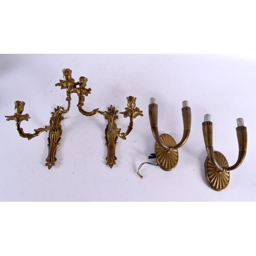 795 - THREE BRASS WALL SCONCES and another. Largest 35 cm x 25 cm. (4)