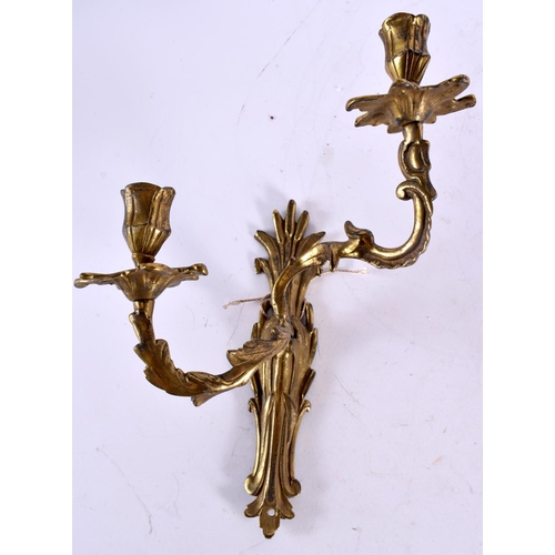 795 - THREE BRASS WALL SCONCES and another. Largest 35 cm x 25 cm. (4)