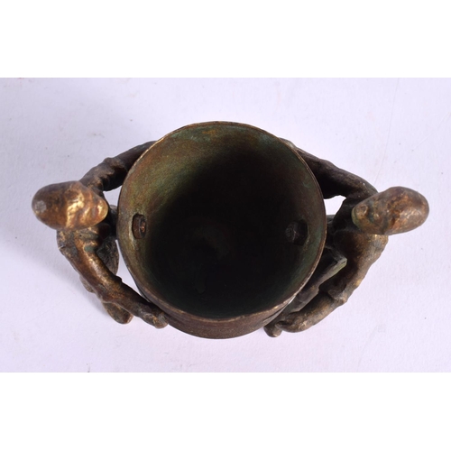 799 - AN UNUSUAL EARLY 20TH CENTURY EUROPEAN COLD PAINTED BRONZE CENSER formed with two boys holding aloft... 