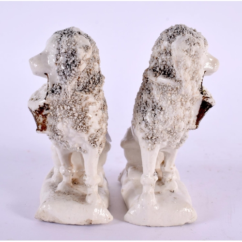 81 - A PAIR OF 19TH CENTURY STAFFORDSHIRE PORCELAIN FIGURES modelled holding baskets. 9 cm x 5 cm.