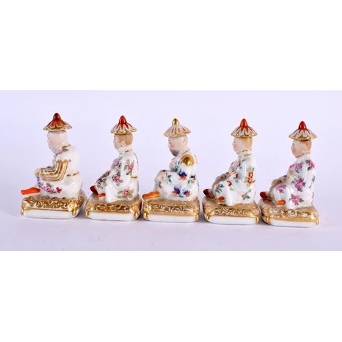 82 - A RARE SET OF FIVE MINIATURE 19TH CENTURY FRENCH PORCELAIN SCENT BOTTLES AND STOPPERS painted with f... 