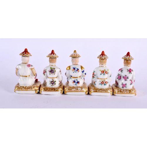 82 - A RARE SET OF FIVE MINIATURE 19TH CENTURY FRENCH PORCELAIN SCENT BOTTLES AND STOPPERS painted with f... 