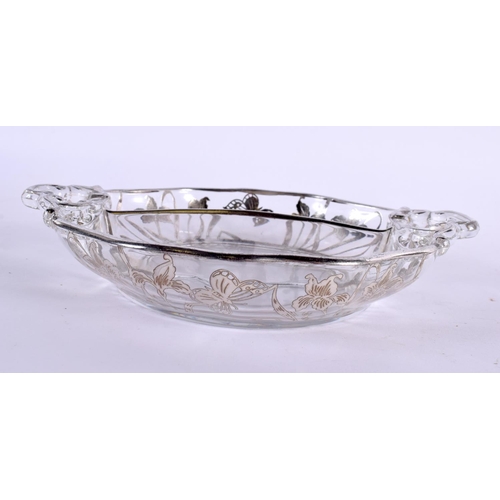 83 - AN ART NOUVEAU SILVER OVERLAID GLASS BASKET.18 cm x 16 cm.