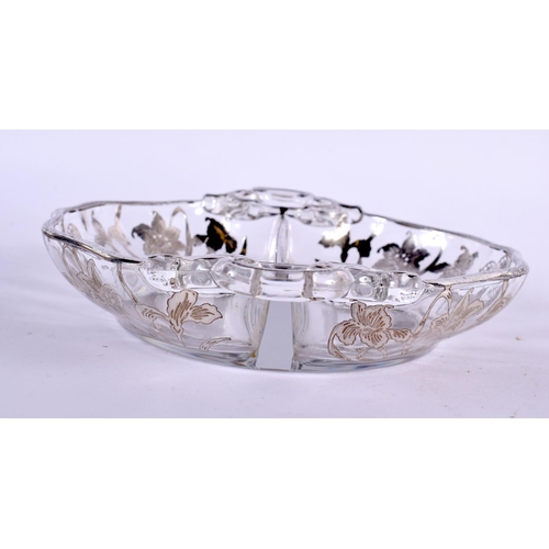 83 - AN ART NOUVEAU SILVER OVERLAID GLASS BASKET.18 cm x 16 cm.