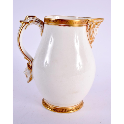 85 - A GRADUATED SET OF THREE 19TH CENTURY ENGLISH PORCELAIN JUGS. Largest 20 cm x 12 cm. (3)