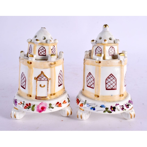 48 - AN UNUSUAL PAIR OF EARLY 19TH CENTURY ENGLISH PORCELAIN POT POURRI AND COVERS formed as houses, pain... 