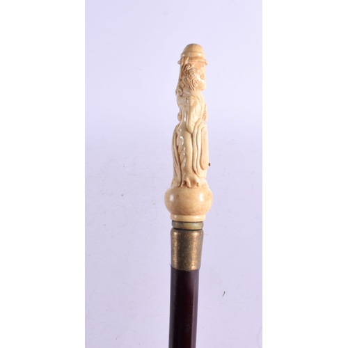 484 - A CONTEMPORARY CARVED ORIENTAL FEMALE WALKING CANE 90 cm long.