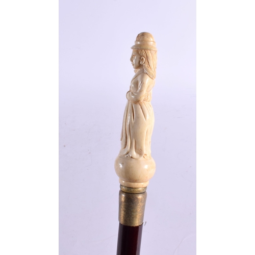 484 - A CONTEMPORARY CARVED ORIENTAL FEMALE WALKING CANE 90 cm long.