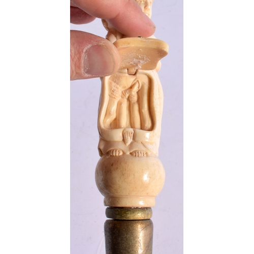 484 - A CONTEMPORARY CARVED ORIENTAL FEMALE WALKING CANE 90 cm long.