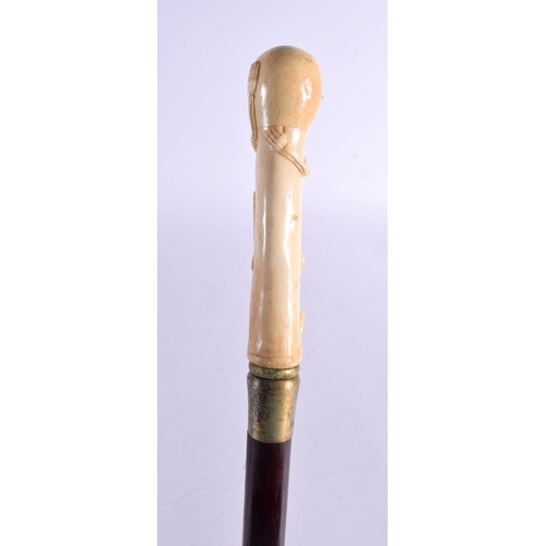 486 - A CONTEMPORARY CARVED BONE SKELTETON WALKING CANE 90 cm long.