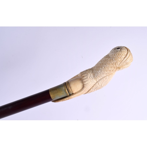 488 - A CONTEMPORARY CARVED BONE PARROT WALKING CANE 90 cm long.