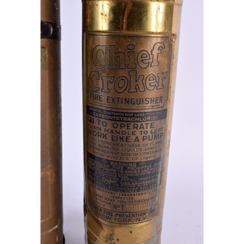 491 - TWO BRASS FIRE EXTINGUISHERS. 38 cm long. (2)