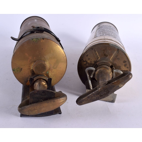 491 - TWO BRASS FIRE EXTINGUISHERS. 38 cm long. (2)