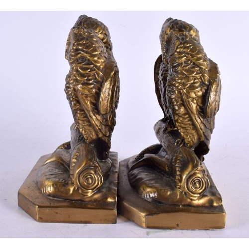 477 - A PAIR OF ART DECO OWL BRONZE BOOK ENDS. 16 cm x 10 cm.