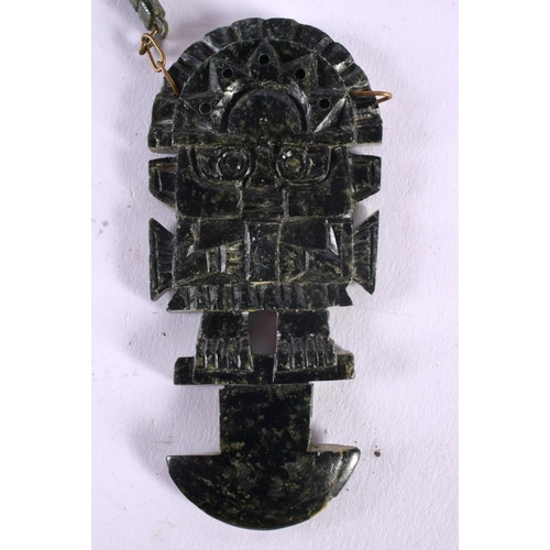 1003 - A VINTAGE SOUTH AMERICAN TRIBAL CARVED STONE NECKLACE. 73 cm long, pendant 9.25 cm x 4.25 cm.