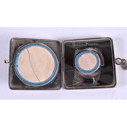 1004 - AN ART DECO WHITE METAL AND ENAMEL COMPACT. 89 grams. 6 cm x 1.5 cm.