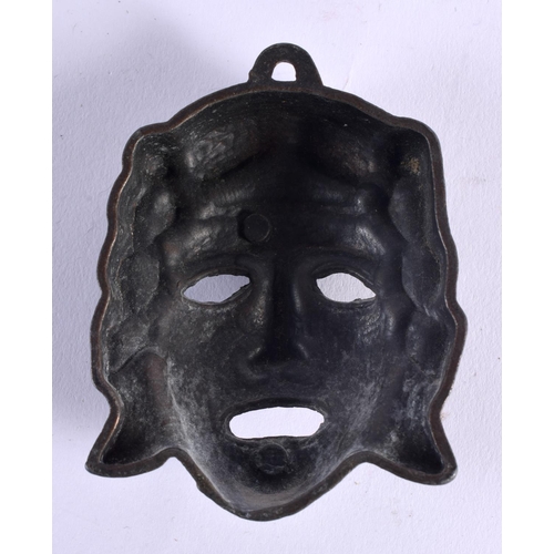 1005 - A CLASSICAL GRAND TOUR BRONZE MASK HEAD PLAQUE. 9.25 cm x 7 cm.