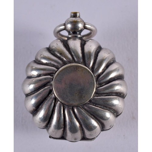 1023 - AN ANTIQUE WHITE METAL SHELL FORM SOVEREIGN CASE. 24.8 grams. 4.75 cm x 3.5 cm.