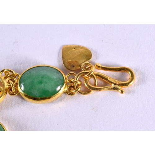 1027 - A CHINESE REPUBLICAN PERIOD 22CT GOLD AND JADEITE BRACELET. 16.9 grams. 19 cm long.