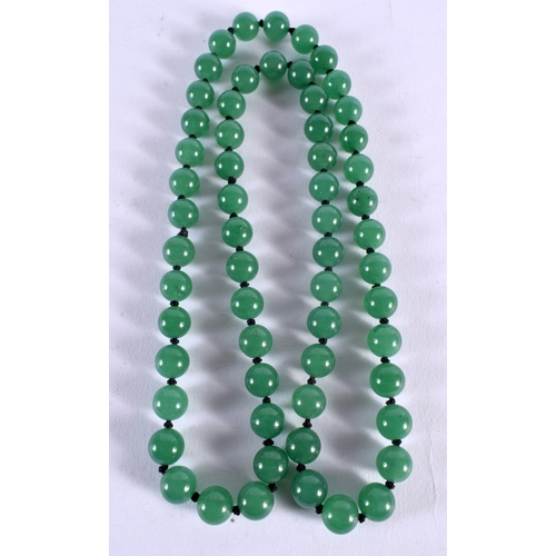 1029 - A CHINESE JADE NECKLACE. 88 grams. 73 cm long.