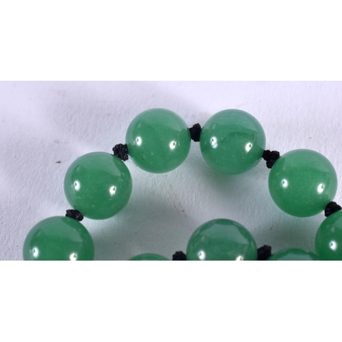 1029 - A CHINESE JADE NECKLACE. 88 grams. 73 cm long.