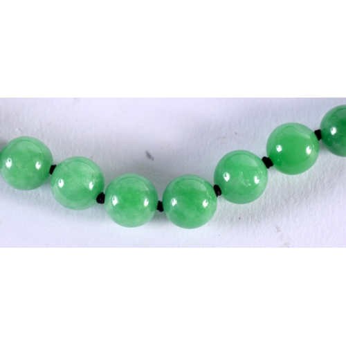 1047 - A CHINESE 14CT GOLD AND JADEITE NECKLACE. 168 grams. 62 cm long.