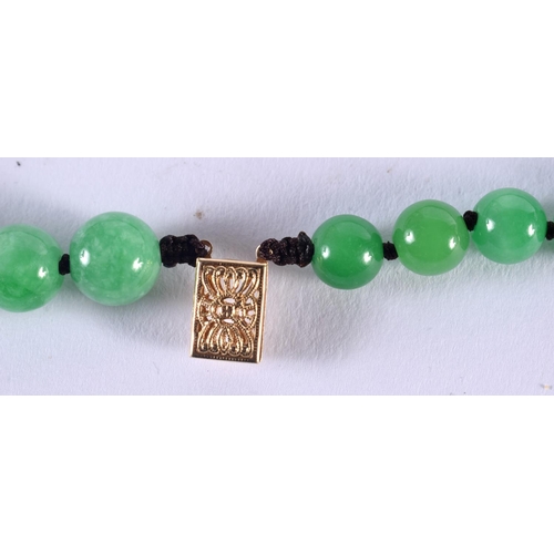 1047 - A CHINESE 14CT GOLD AND JADEITE NECKLACE. 168 grams. 62 cm long.