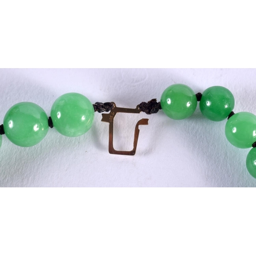 1047 - A CHINESE 14CT GOLD AND JADEITE NECKLACE. 168 grams. 62 cm long.