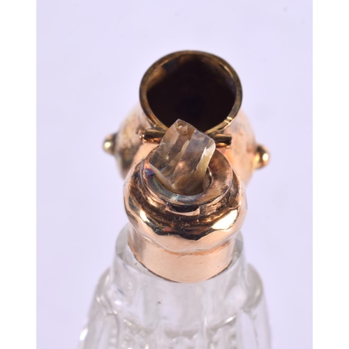 1049 - AN 18CT GOLD MOUNTED GLASS SCENT BOTTLE. 49 grams. 11 cm x 3.75 cm.