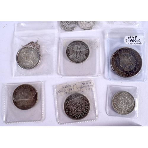 1060 - TWENTY ONE SILVER COINS. 212 grams. Largest 3.75 cm wide. (21)